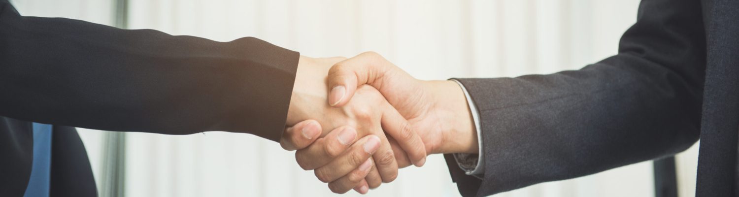 Negotiating business,Image businesswomen handshake,happy with work,business woman she is enjoying with her workmate,Handshake Gesturing People Connection Deal Concept.